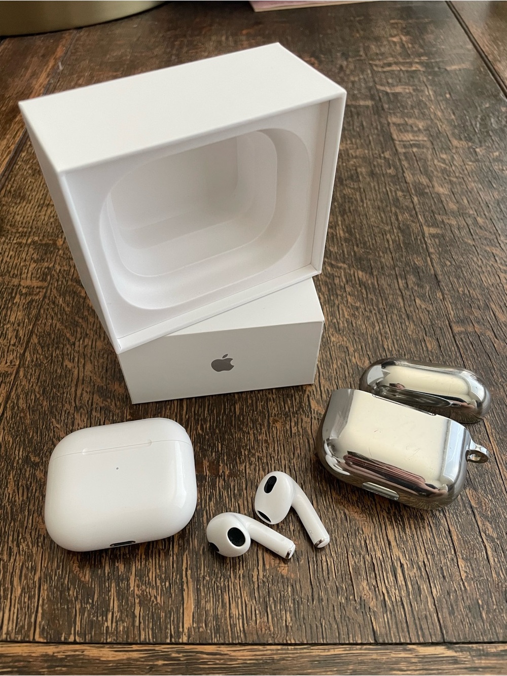 Apple White AirPods 3 with Charging Case and Silver Casetify Protective Case